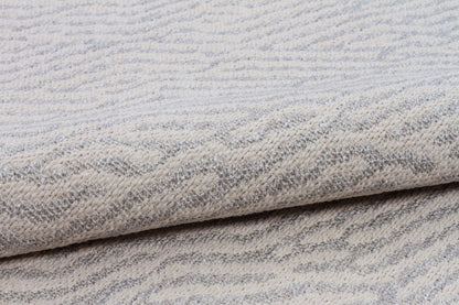 Close-up of textured fabric with a subtle pattern