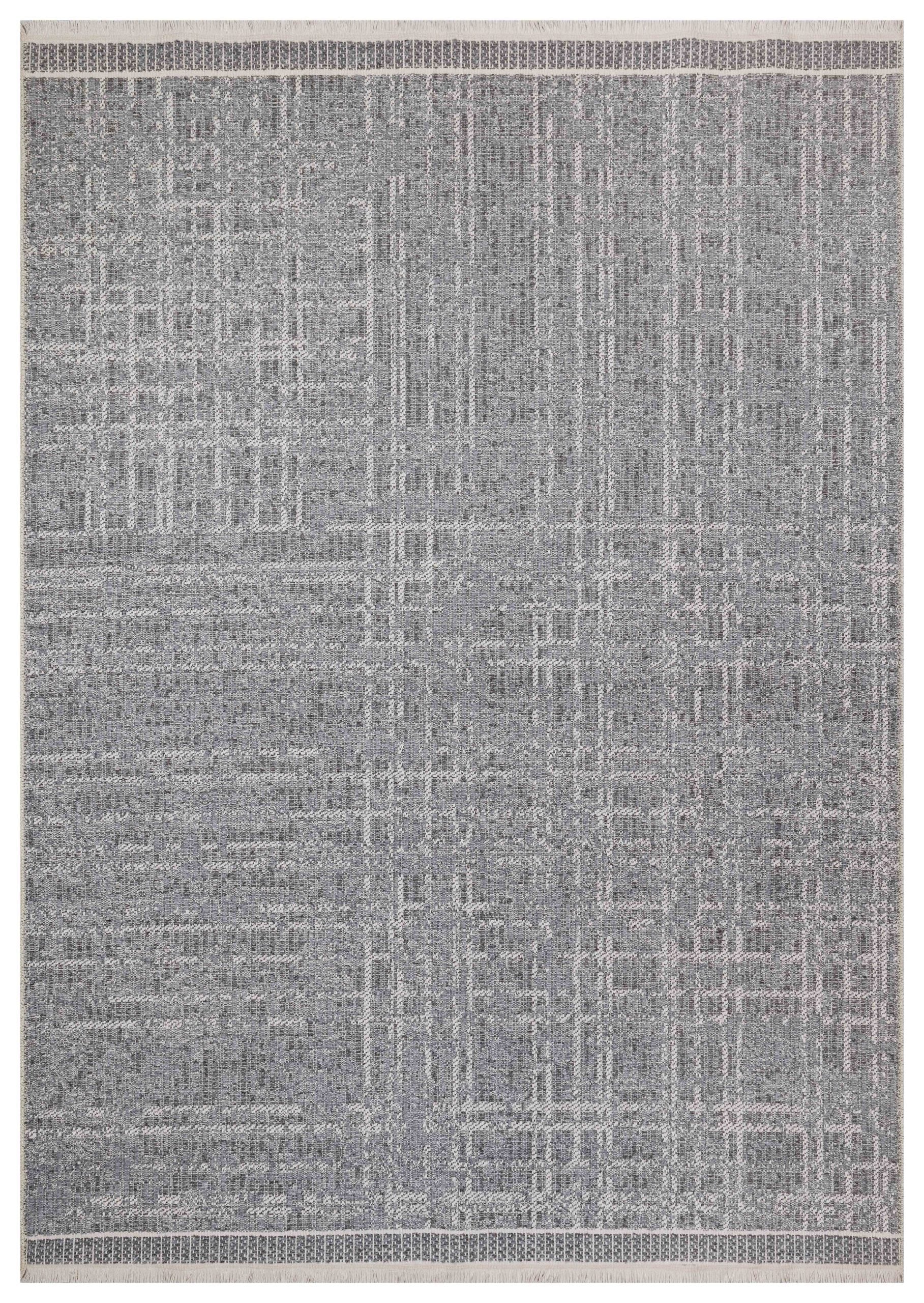 Gray patterned rug with a subtle geometric design