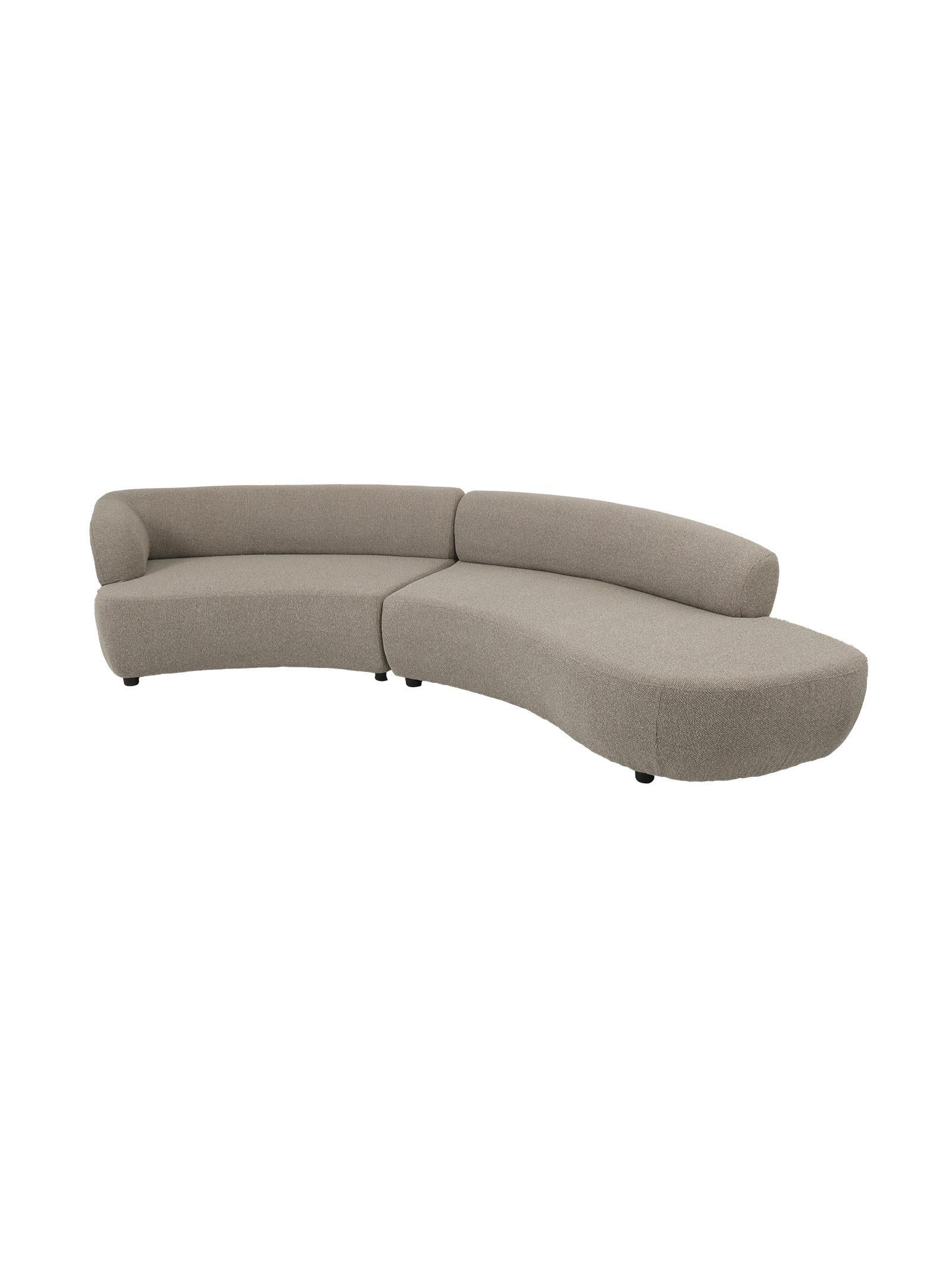 Curved beige sofa on a white background