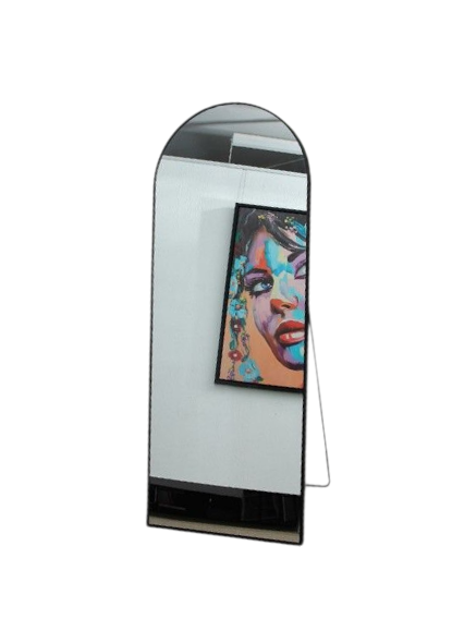 Long, narrow mirror with a framed artwork on a white background