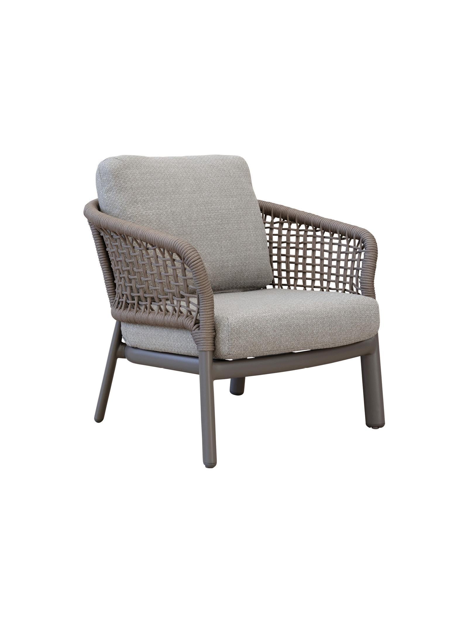 Chair with woven frame and gray cushions on a white background