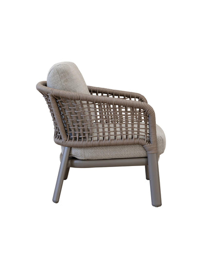 Wicker chair with cushion on a white background