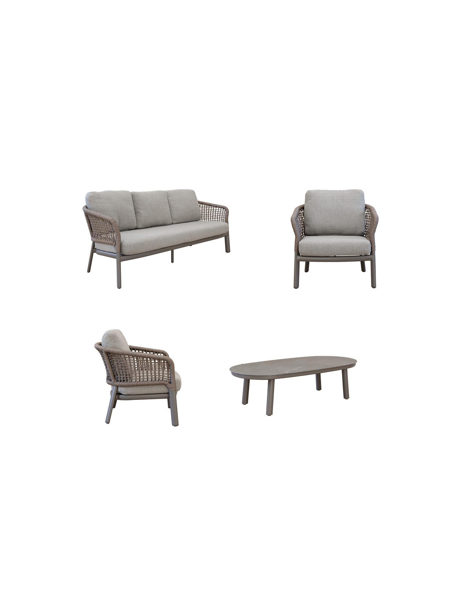 Outdoor furniture set with sofa, armchair, and table on a white background