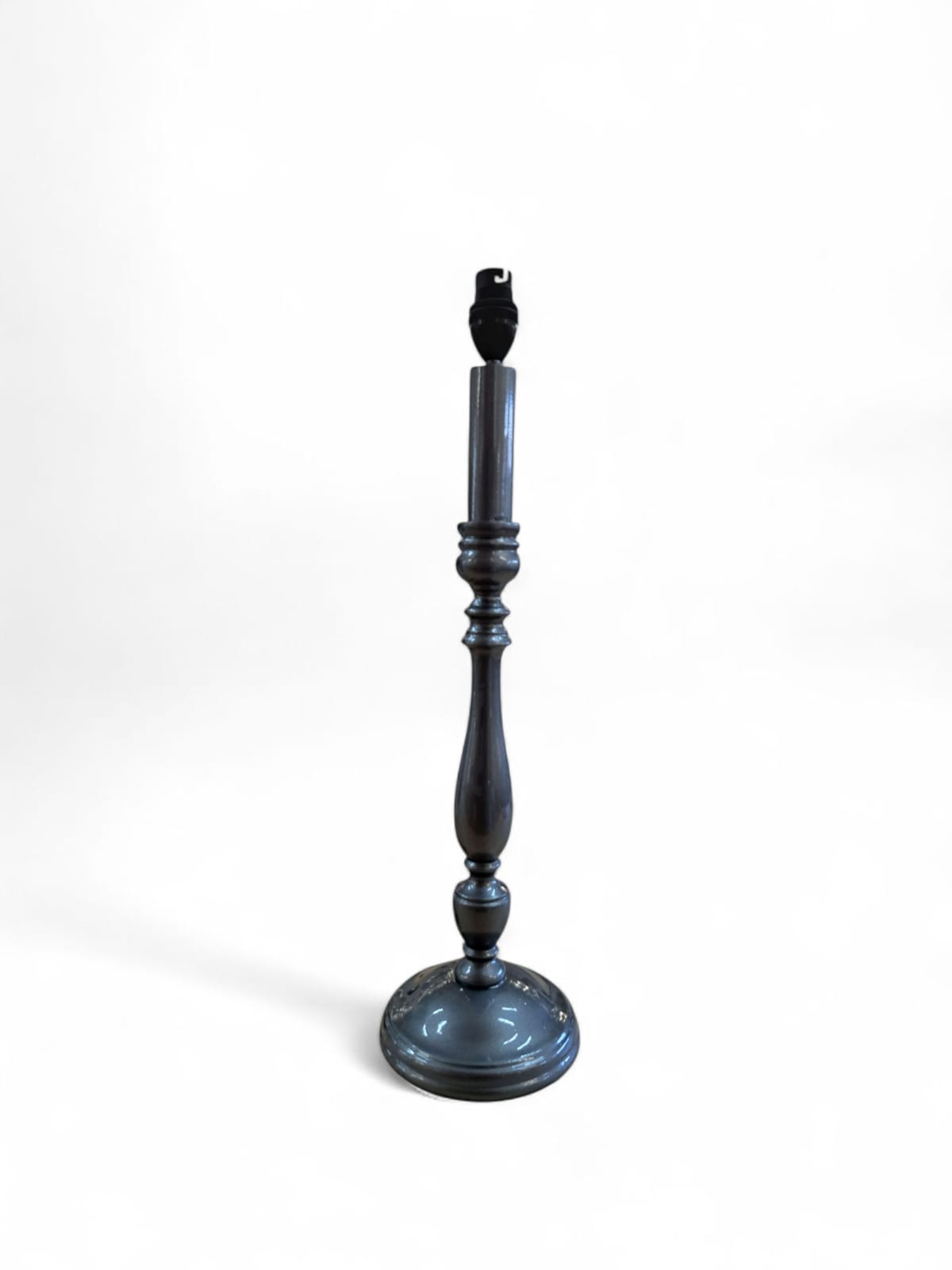 Decorative black candelabra on a white background