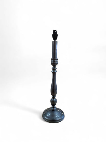 Decorative black candelabra on a white background