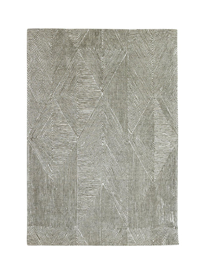 Olive geometric patterned rug on a white background