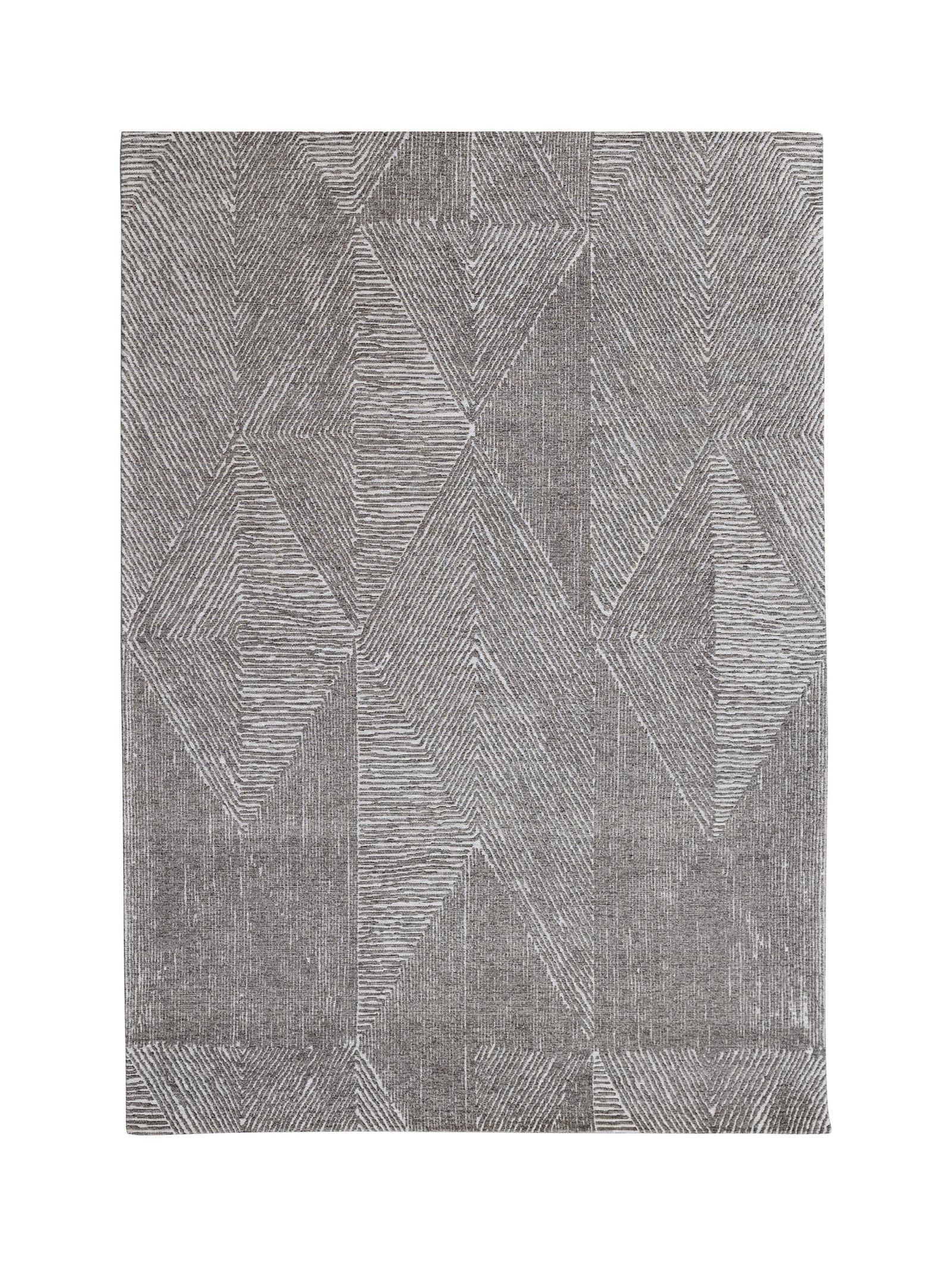 Gray geometric patterned rug on a white background