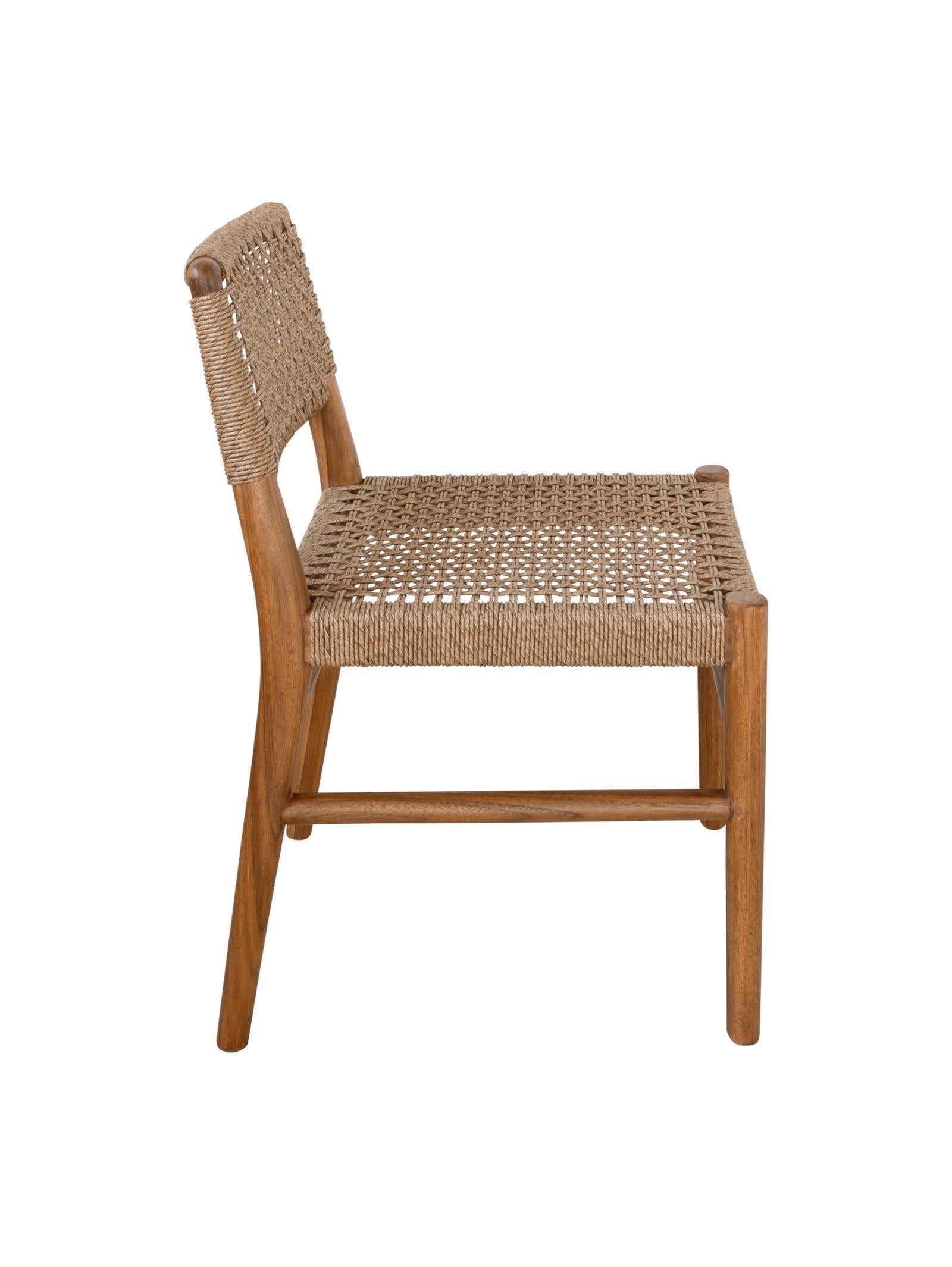teak outdoor chair, UV-resistant rope, patio furniture, Greenhaus, Goa Teak Side Chair with solid teak frame and woven rope seat

Outdoor teak chair with UV-resistant rope and natural wood finish

Close-up of Goa Teak Chair showing rope weave and teak texture

Handcrafted teak side chair with weather-proof rope backrest

Solid teak outdoor chair featuring curved rope seat and back

Goa Teak Chair detail showing smooth finish and durable joinery

Modern teak side chair with dark rope accents – Greenhaus Outd