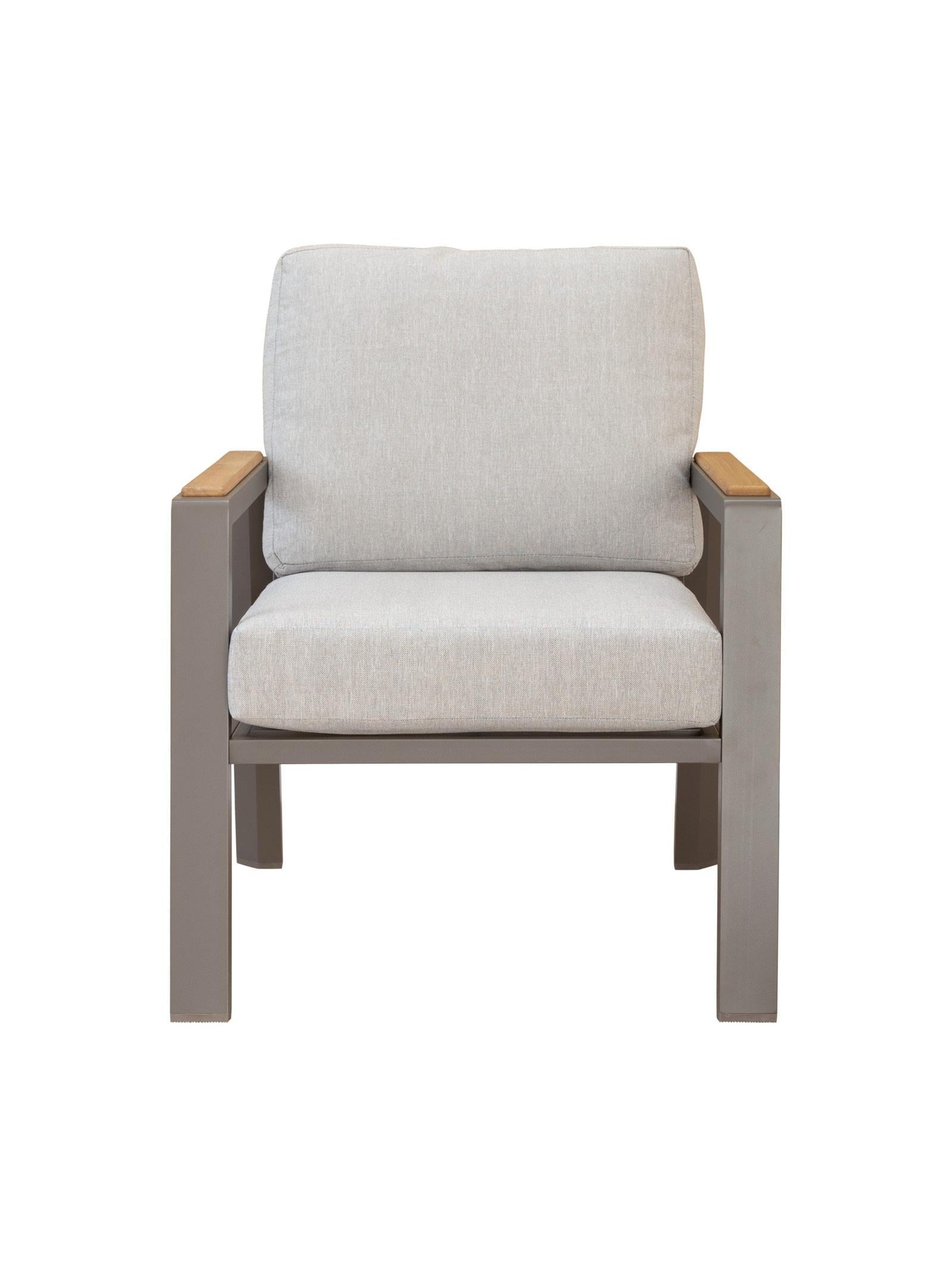 Chair with light gray cushion and wooden armrests on a white background