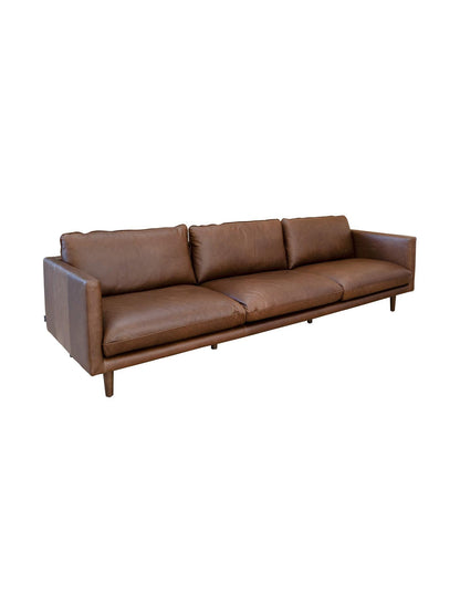 Brown leather sofa on a white background