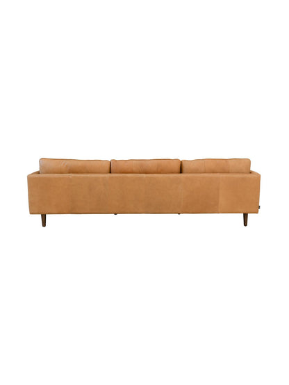 Tan sofa on a white background