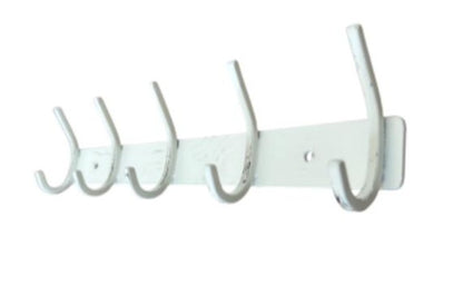 White wall-mounted coat rack with multiple hooks on a white background