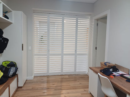 Custom Curtains, Blinds & Shutters