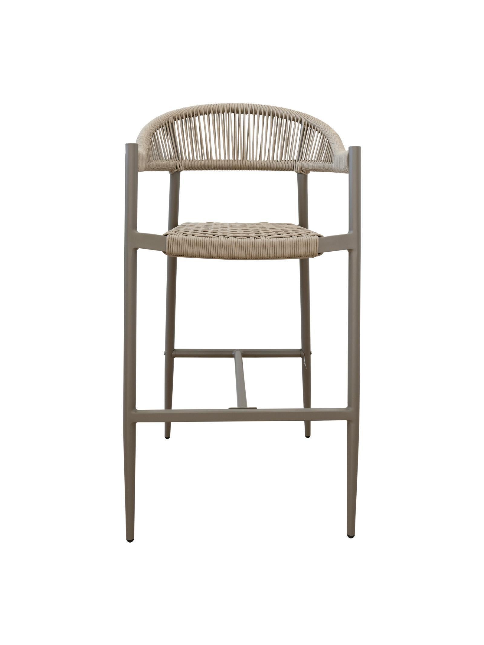 Iona Outdoor Bar Chair with aluminium frame and woven UV-resistant rope seat on patio

Close-up of Iona bar chair showing detailed rope weave and metal frame

Set of Iona outdoor bar chairs arranged around outdoor bar counter

Iona Outdoor Bar Chair styled on wooden deck with scenic outdoor background

Back view of Iona bar chair highlighting UV-resistant rope backrest design

Iona bar chair from the Iona outdoor furniture collection with coordinating pieces