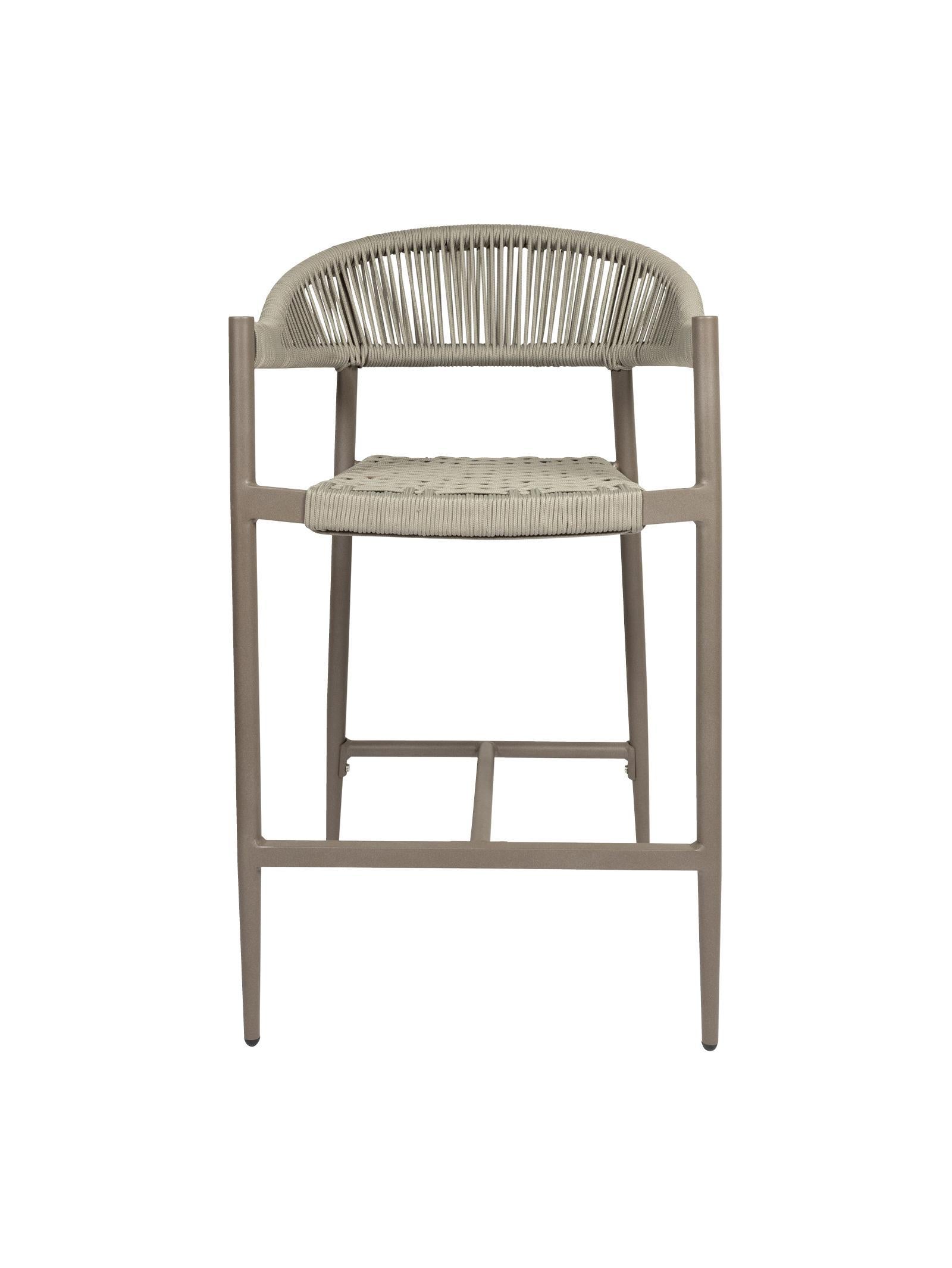 Iona Outdoor Counter Chair with aluminium frame and woven UV-resistant rope seat on patio

Close-up of Iona counter chair showing detailed rope weave and metal frame

Pair of Iona outdoor counter chairs at outdoor kitchen counter or bar area

Iona Outdoor Counter Chair styled on deck with scenic outdoor backdrop

Back view of Iona counter chair highlighting UV-resistant rope backrest design

Iona counter chair from the Iona outdoor furniture collection with matching pieces