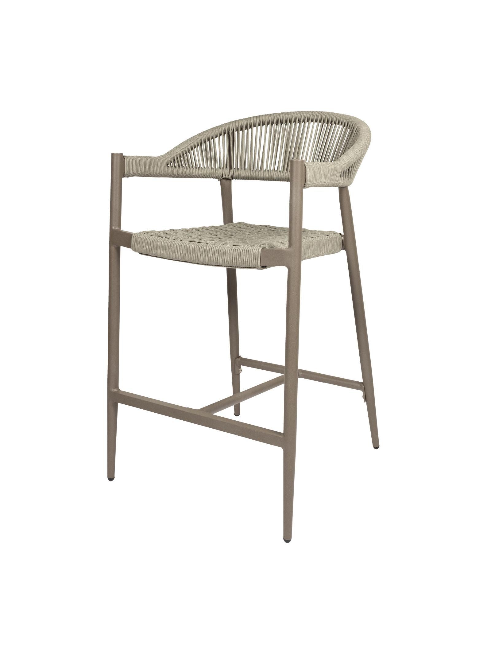 Iona Outdoor Counter Chair with aluminium frame and woven UV-resistant rope seat on patio

Close-up of Iona counter chair showing detailed rope weave and metal frame

Pair of Iona outdoor counter chairs at outdoor kitchen counter or bar area

Iona Outdoor Counter Chair styled on deck with scenic outdoor backdrop

Back view of Iona counter chair highlighting UV-resistant rope backrest design

Iona counter chair from the Iona outdoor furniture collection with matching pieces