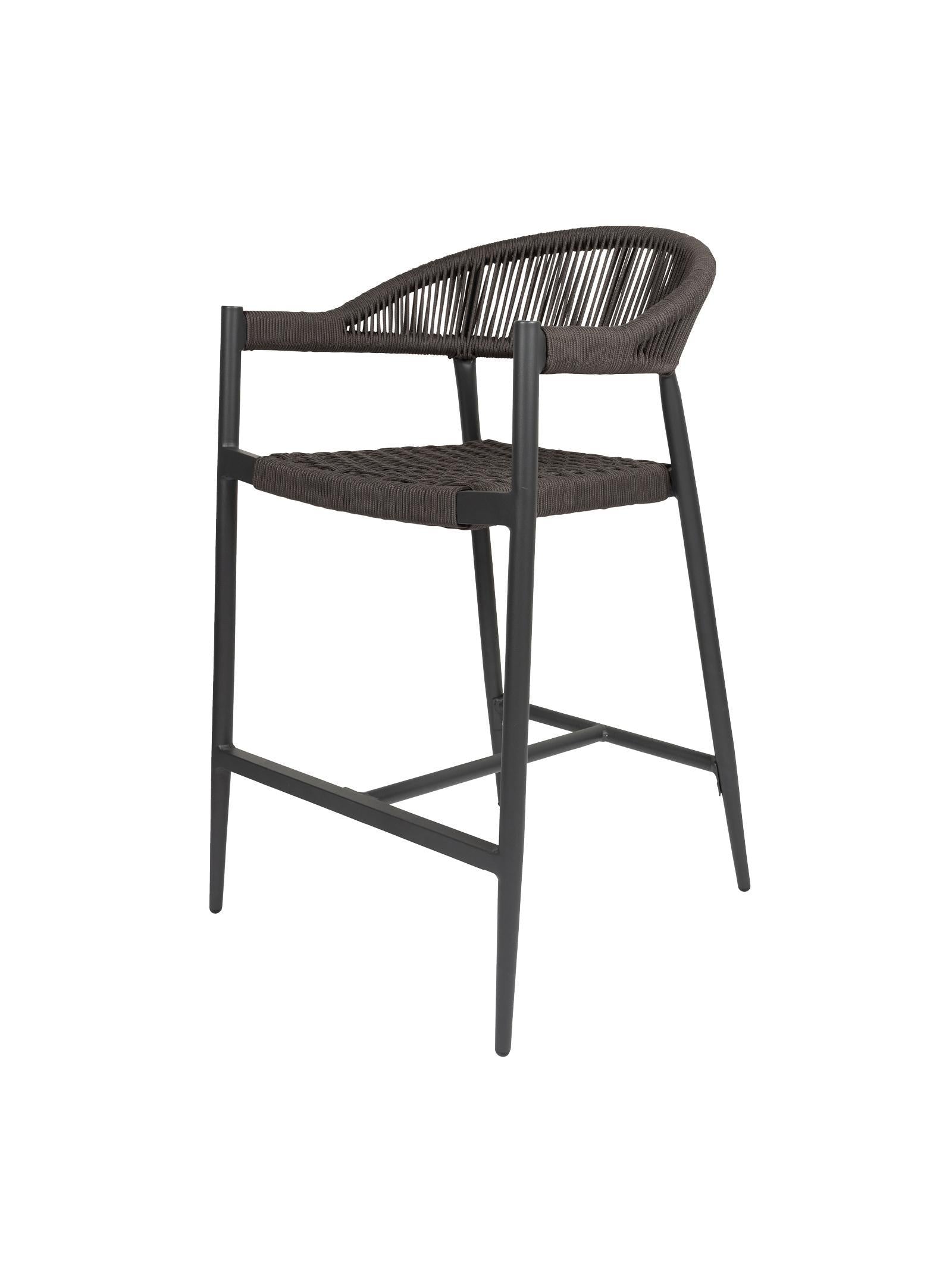 Iona Outdoor Bar Chair with aluminium frame and woven UV-resistant rope seat on patio

Close-up of Iona bar chair showing detailed rope weave and metal frame

Set of Iona outdoor bar chairs arranged around outdoor bar counter

Iona Outdoor Bar Chair styled on wooden deck with scenic outdoor background

Back view of Iona bar chair highlighting UV-resistant rope backrest design

Iona bar chair from the Iona outdoor furniture collection with coordinating pieces