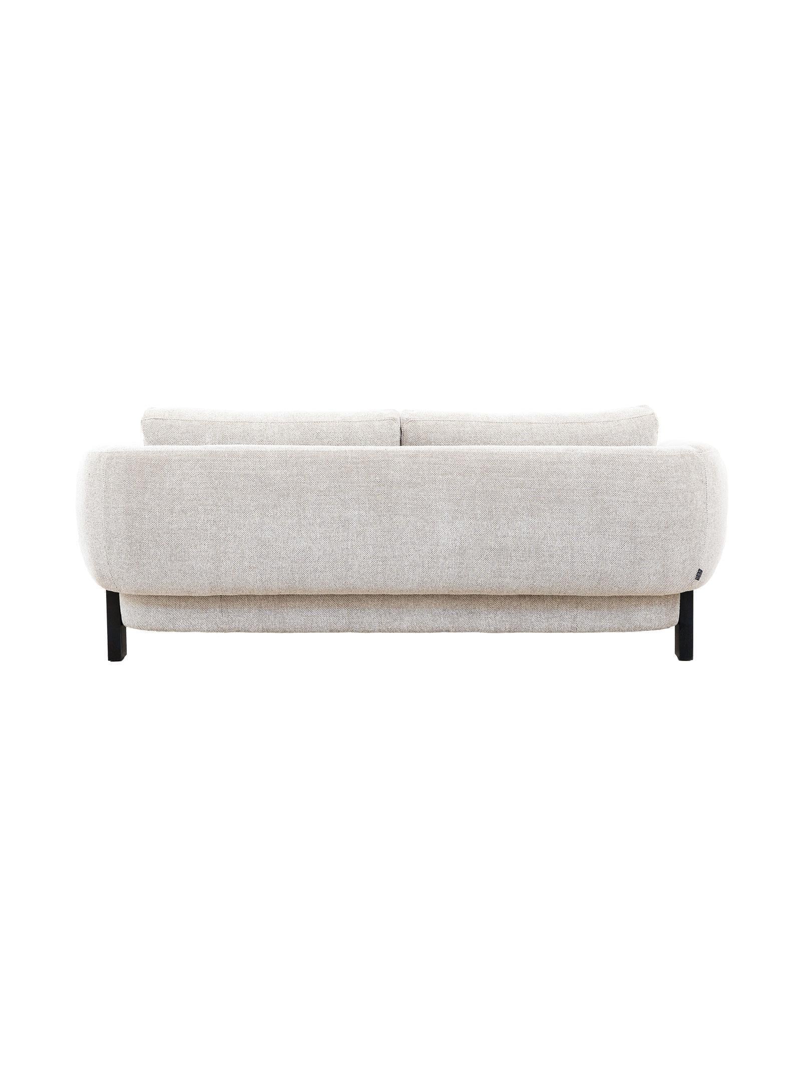Beige sofa on a white background