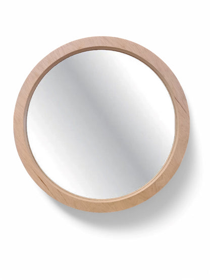 Round mirror with a wooden frame on a white background