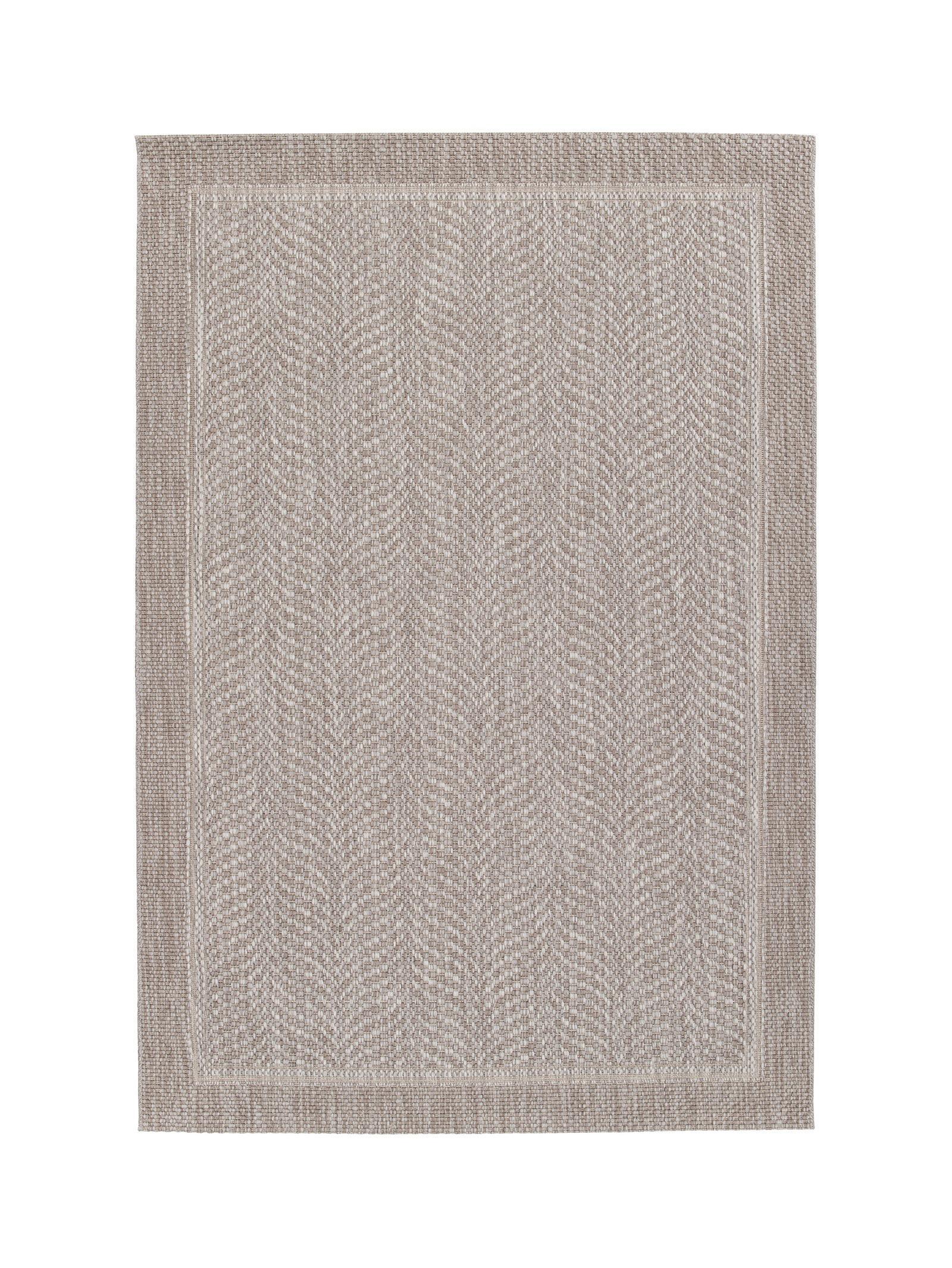 Textured area rug with a geometric pattern on a white background