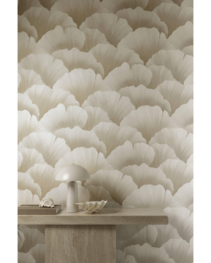 Wallpaper with cloud pattern in beige tones, featuring a table and decorative items.