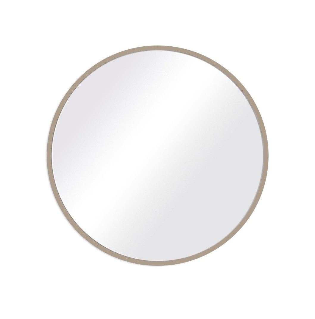 Round mirror with a beige frame on a white background