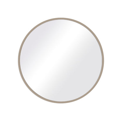 Round mirror with a beige frame on a white background