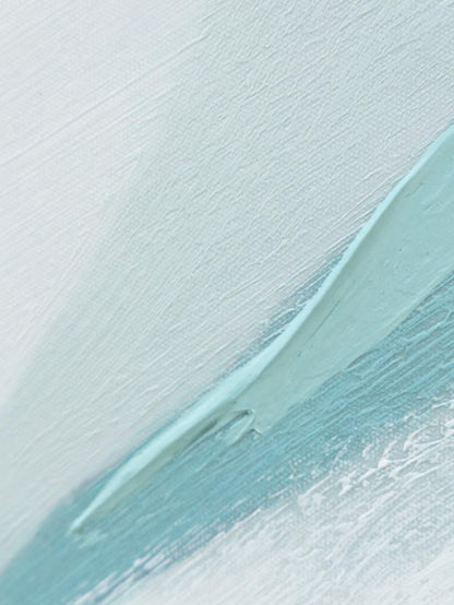 Close-up of a textured surface with a light blue brushstroke