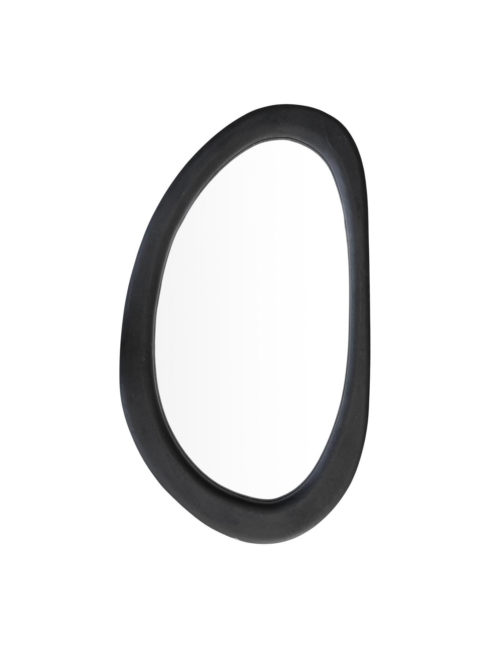 Black wooden mirror on a white background