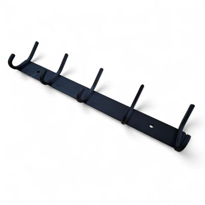 Black metal wall hook rack with multiple hooks on a white background