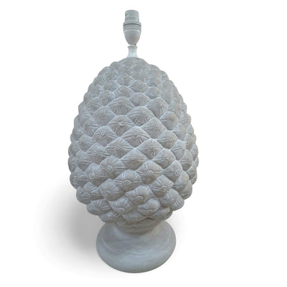 Decorative pineapple-shaped object on a white background