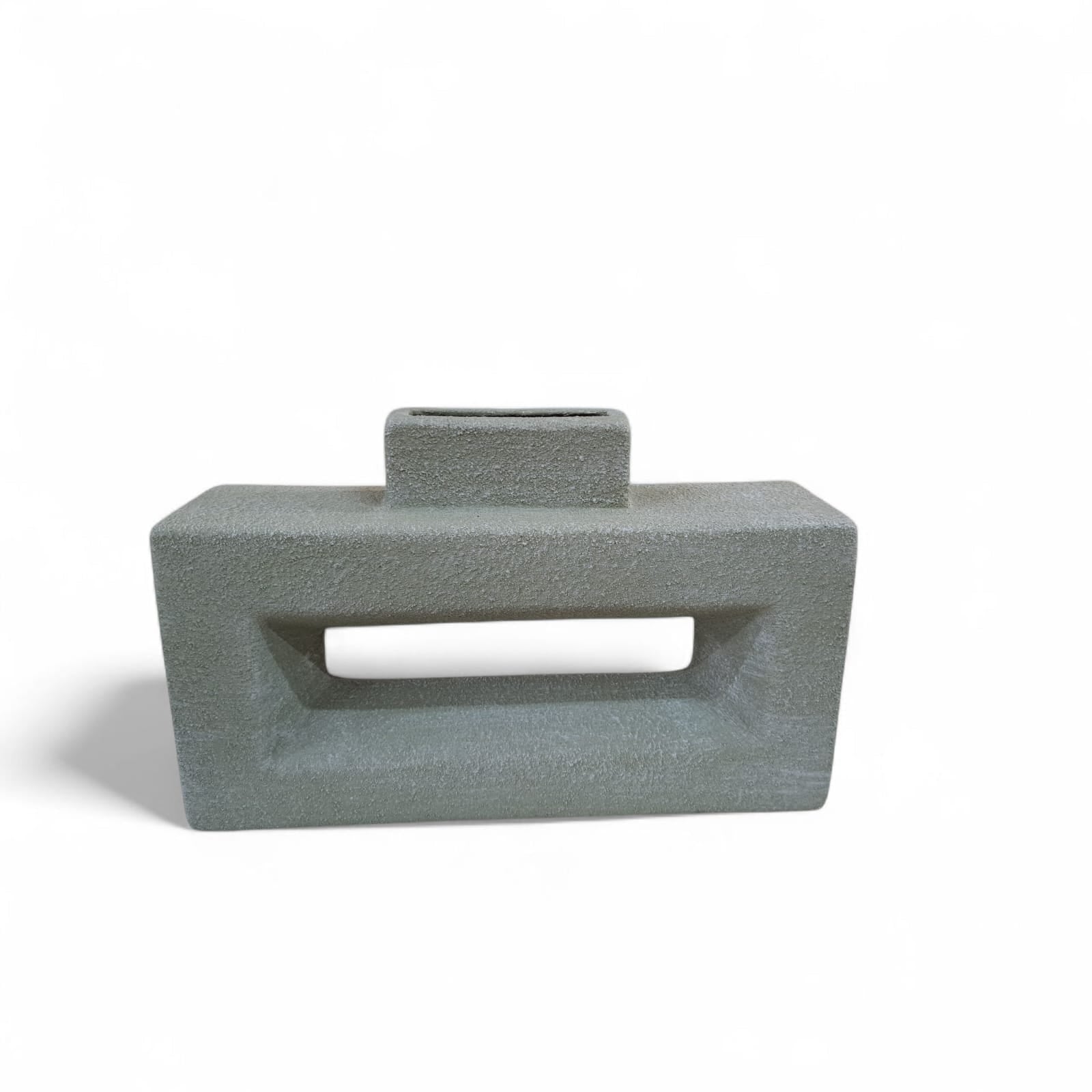 Sage coloured low vase with a hole in the middle