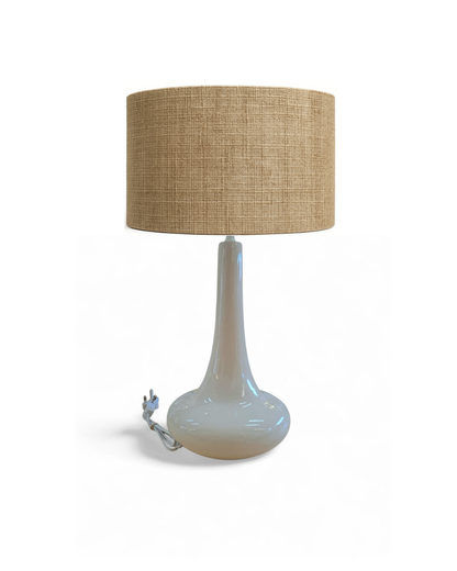 The Jill Lamp with a tall slender neck and rounded stone-gloss base.”